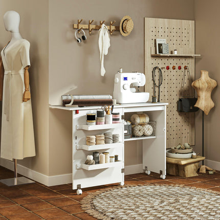 Folding Sewing Table with Drop Leaf, Storage Bins, Open Shelf & Wheels - White