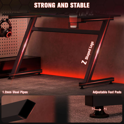 Gaming Desk with Steel Frame, Cup Holder, Headphone Hook, Adjustable Feet & Cable Organiser - Black