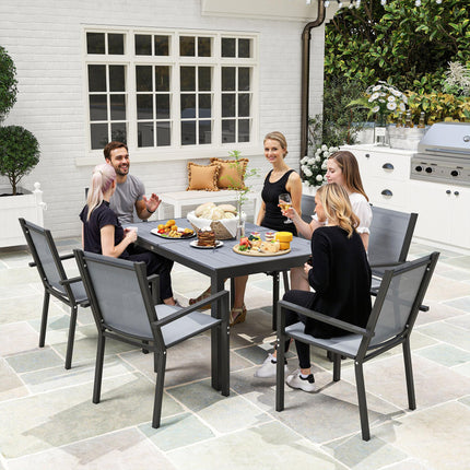 7 Pieces Garden Dining Set with Wood-Plastic Composite Table and 6 Stackable Mesh Armchairs - Grey