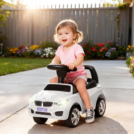 Ride On Sliding Car Toddler Walker with Horn, Music, Lights & Storage - White