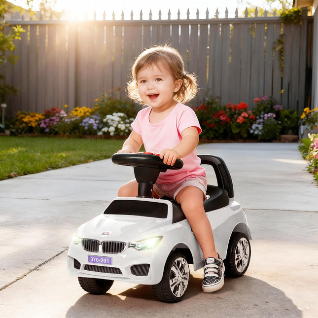 Ride On Sliding Car Toddler Walker with Horn, Music, Lights & Storage - White